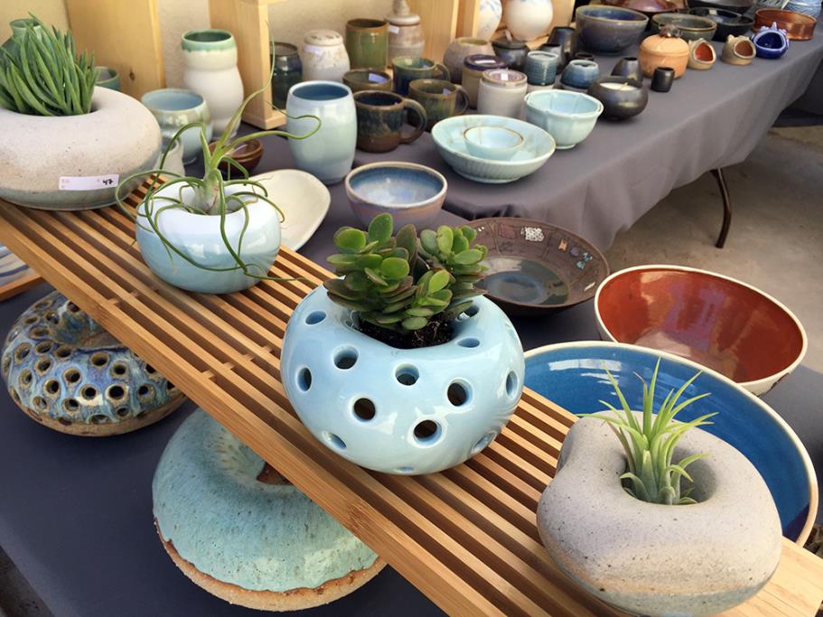 Various ceramic plates, vases, etc. made by ceramics students at the Manhattan Beach Ceramics Studio